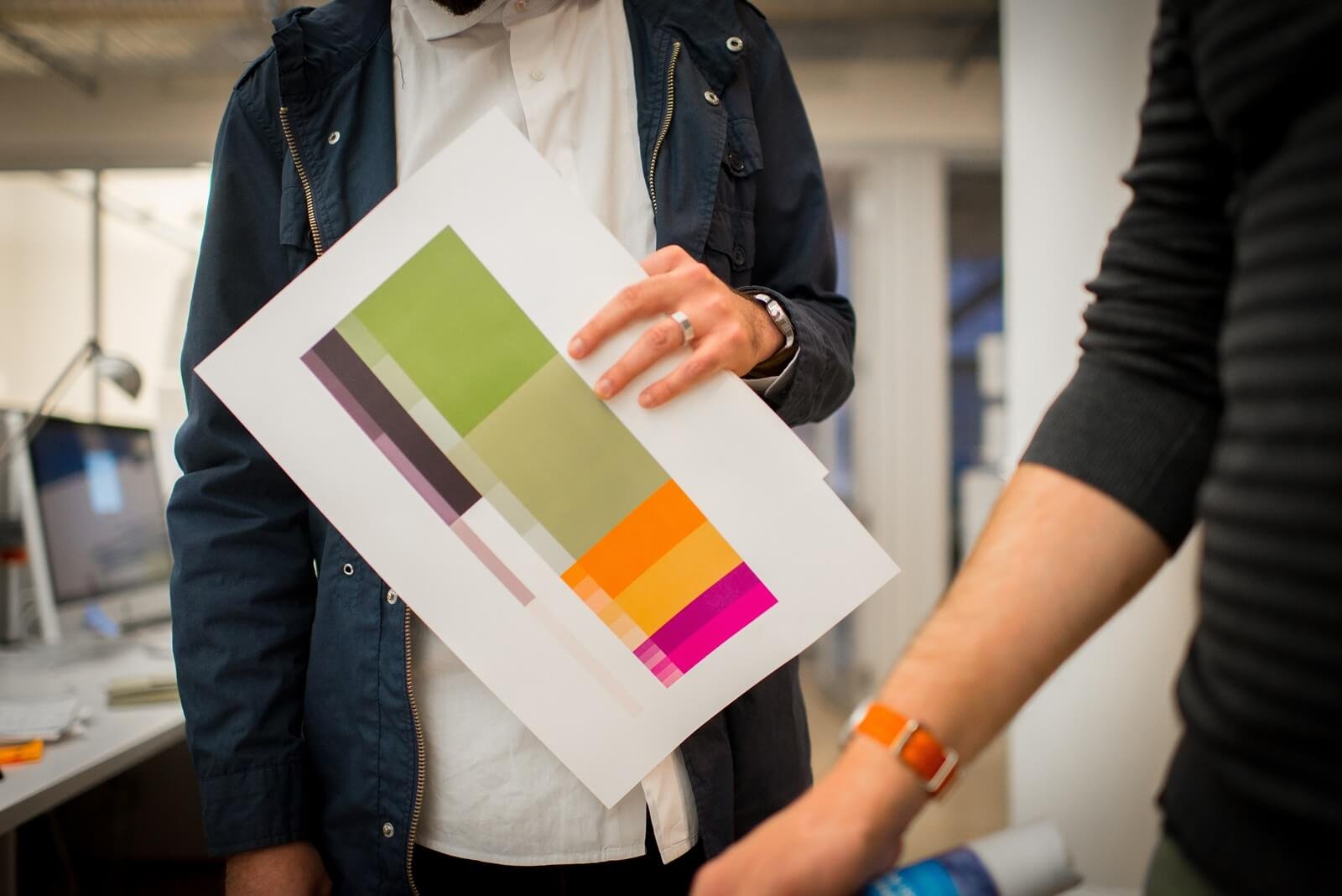 designer critique with printout on the desk in the w6bf2ye.jpg